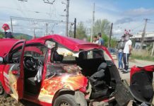 Accident în Dej! Mașină lovită de tren (FOTO)
