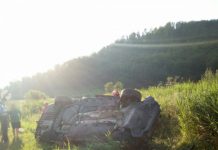 FOTO | Accident cu două mașini în Bologa! Unul din autoturisme s-a răsturnat