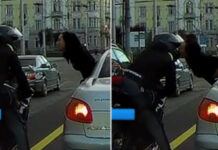 Un motociclist și o șoferiță, sărut romantic în timp ce așteptau la un semafor din Cluj (FOTO)